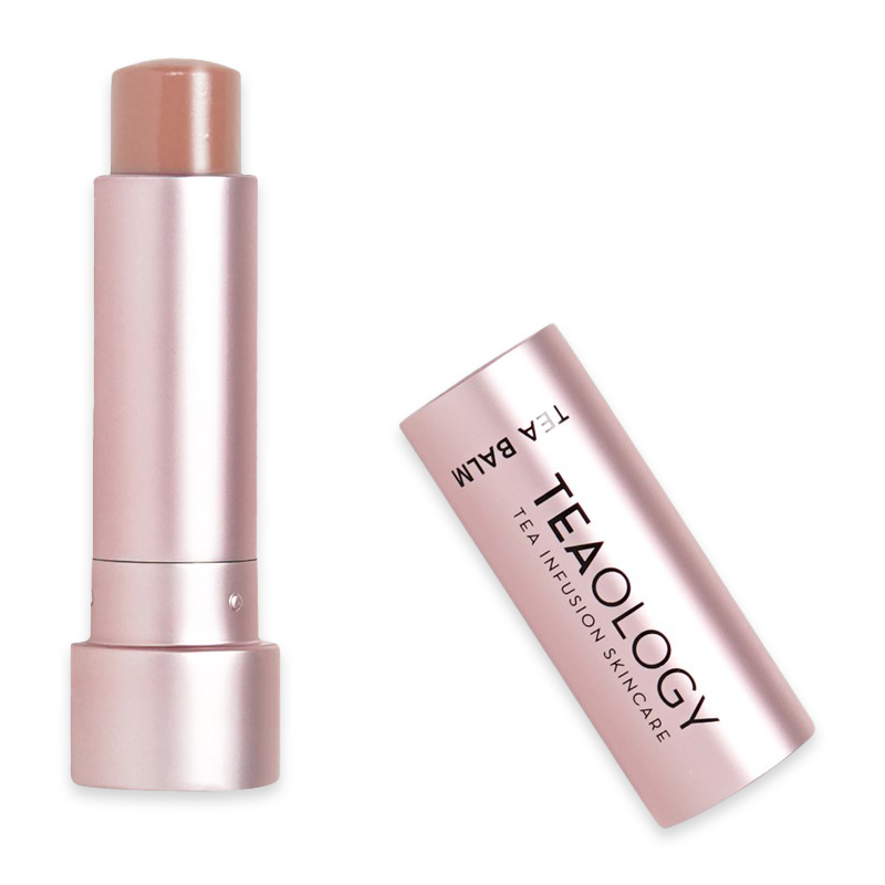 TEAOLOGY Vanilla Tea Lip Balm in rosafarbener Hülse, geöffnet mit abgenommenem Deckel.